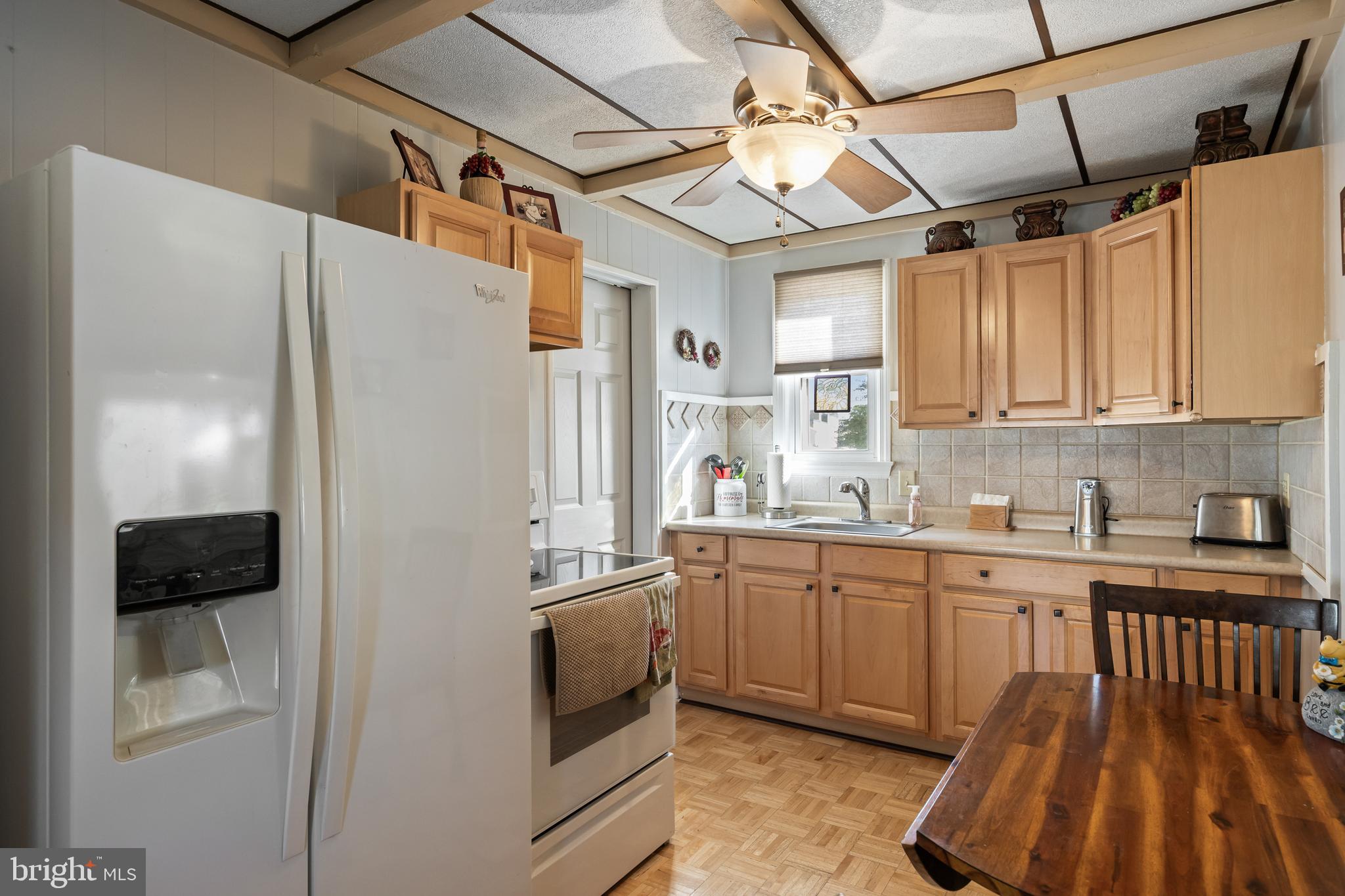 327 South Coles Avenue Maple Shade, NJ 08052 - Photo 10 of 22 a kitchen with cabinets and white appliances
