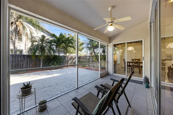 a room with balcony and wooden floor