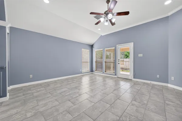 a view of an empty room with a window