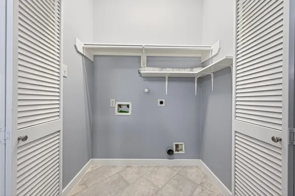 a view of a room with rack on the wall