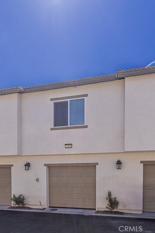 7395 Olive Grv Street Riverside, CA 92507 - Photo 15 of 18 Attached garage with direct access.