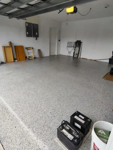 a room with furniture and gym equipment