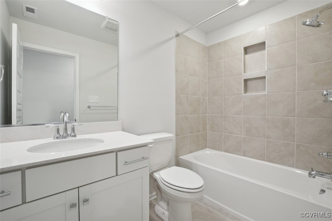 206 That Way Midlothian, VA 23114 - Photo 13 of 25 a bathroom with a sink a toilet and bathtub