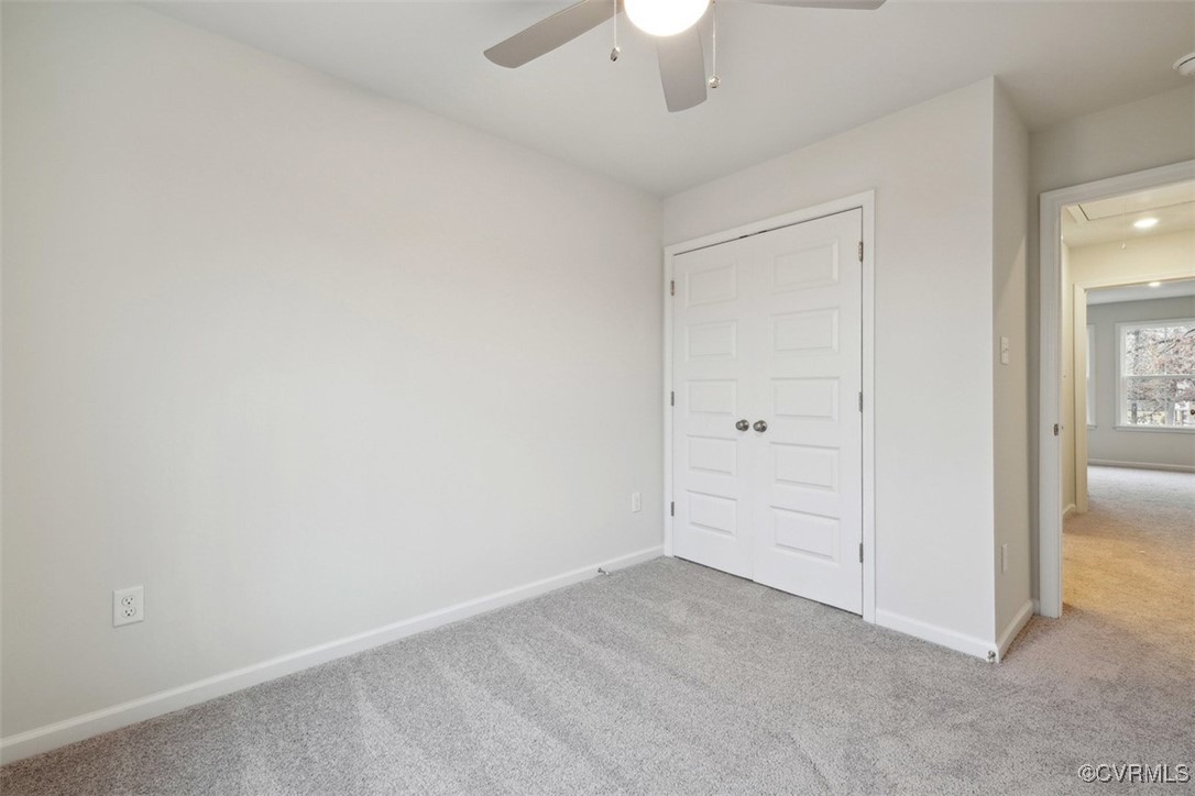 206 That Way Midlothian, VA 23114 - Photo 16 of 25 an empty room with a ceiling fan and entryway