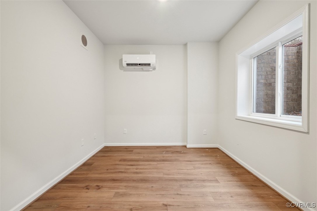 206 That Way Midlothian, VA 23114 - Photo 19 of 25 a view of a room with wooden floor and window