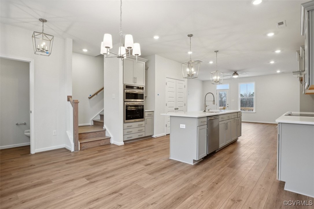 206 That Way Midlothian, VA 23114 - Photo 2 of 25 a large kitchen with granite countertop a large counter top a refrigerator and cabinets
