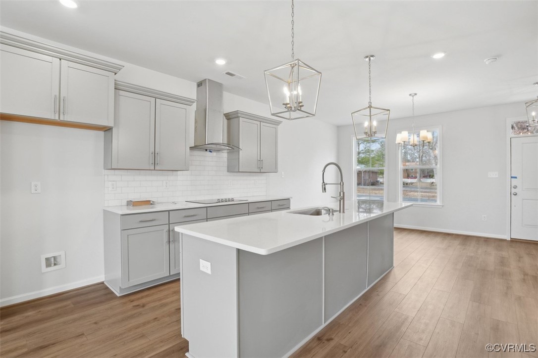 206 That Way Midlothian, VA 23114 - Photo 3 of 25 a kitchen with stainless steel appliances granite countertop a sink a stove a refrigerator and island with wooden floor