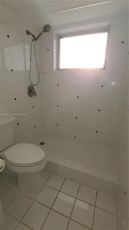 a view of a room with a door