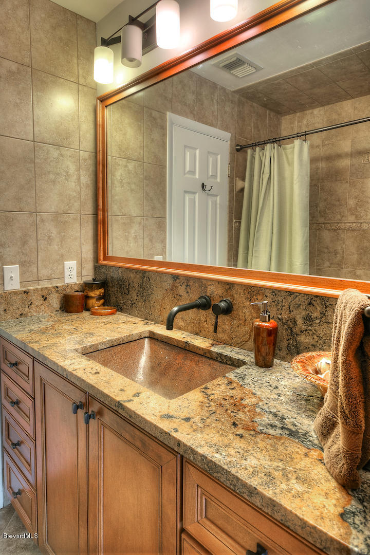 687 Caribbean Road Satellite Beach, FL 32937 - Photo 22 of 32 bathroom2.jpg