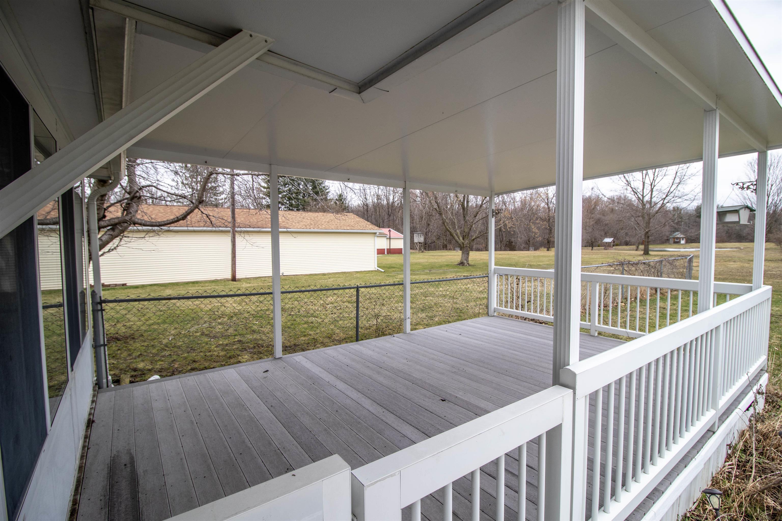 13142 North Center Road Clio, MI 48420 - Photo 37 of 44 Covered Deck