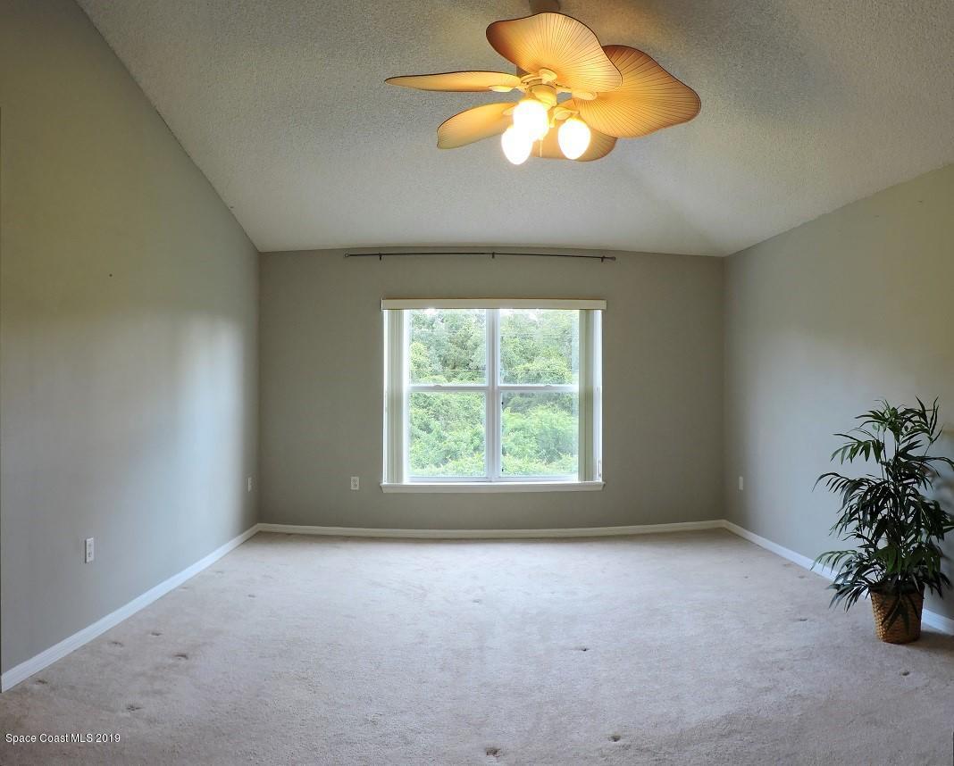 2196 Spring Creek Circle Palm Bay, FL 32905 - Photo 14 of 34 Master Bedroom