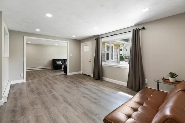 a view of livingroom with furniture and windows