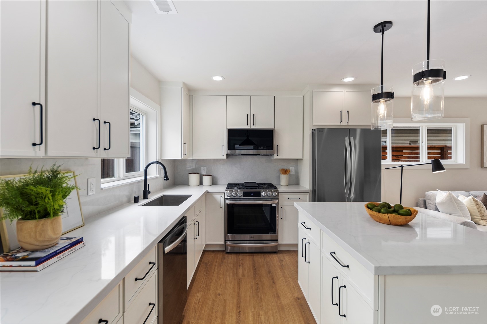 1722 26th Avenue South Seattle, WA 98144 - Photo 11 of 26 a kitchen with a sink a stove and refrigerator