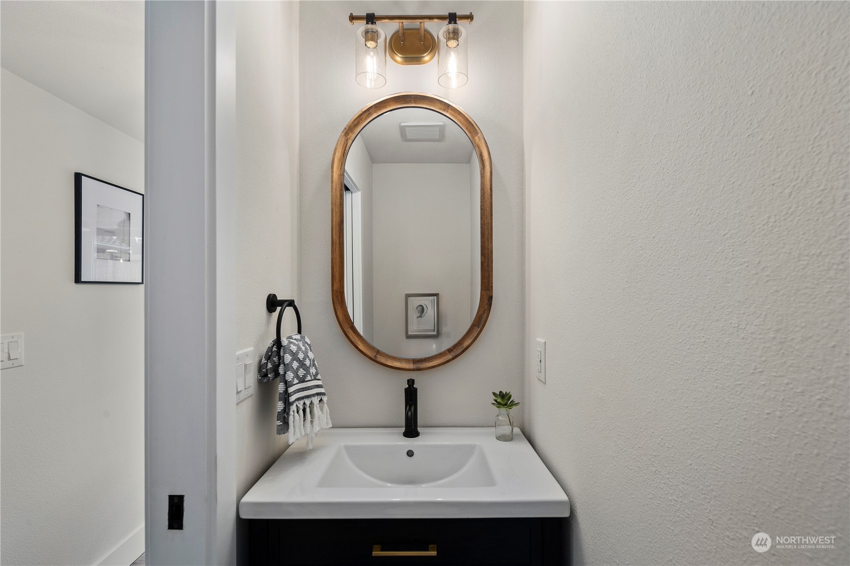 1722 26th Avenue South Seattle, WA 98144 - Photo 13 of 26 a bathroom with a sink and a mirror