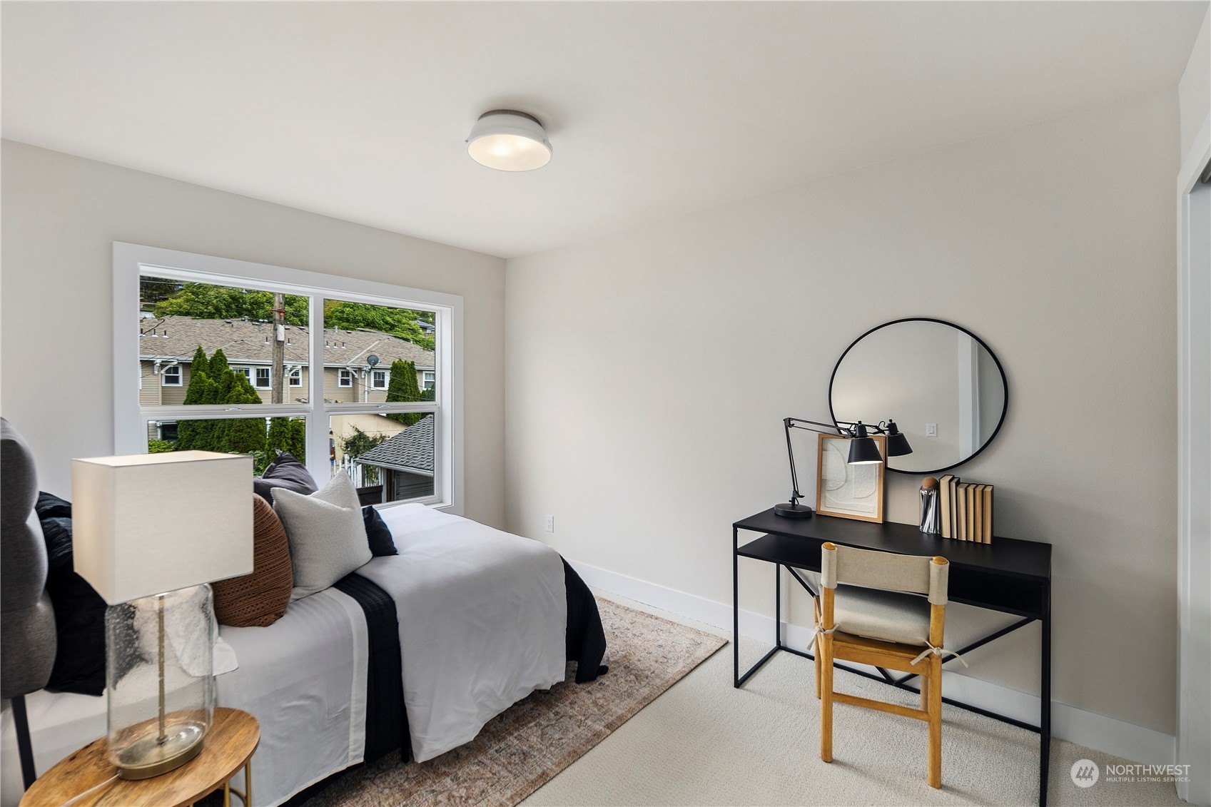 1722 26th Avenue South Seattle, WA 98144 - Photo 17 of 26 a bedroom with furniture and a window