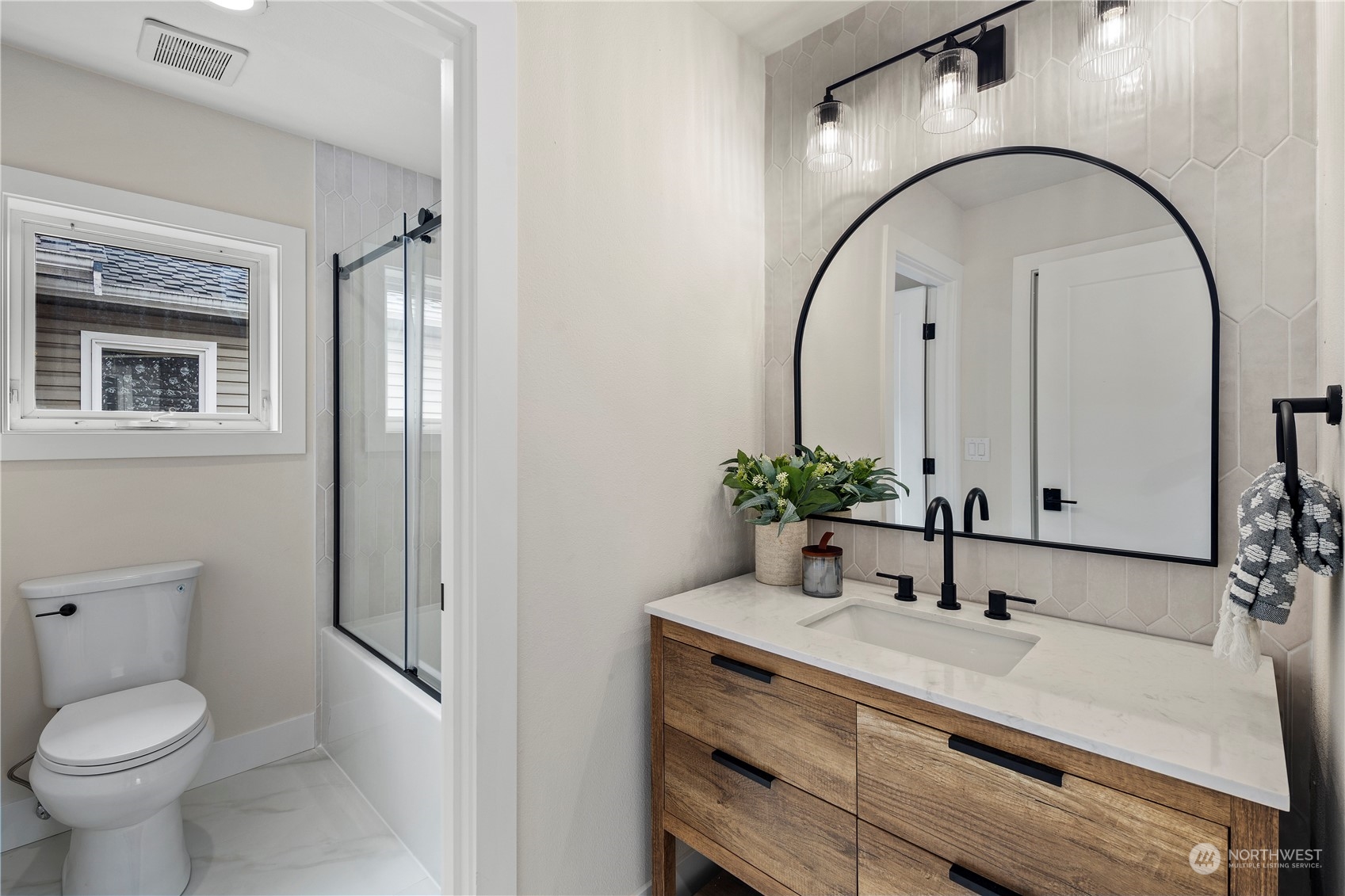 1722 26th Avenue South Seattle, WA 98144 - Photo 19 of 26 a bathroom with a sink toilet and a mirror