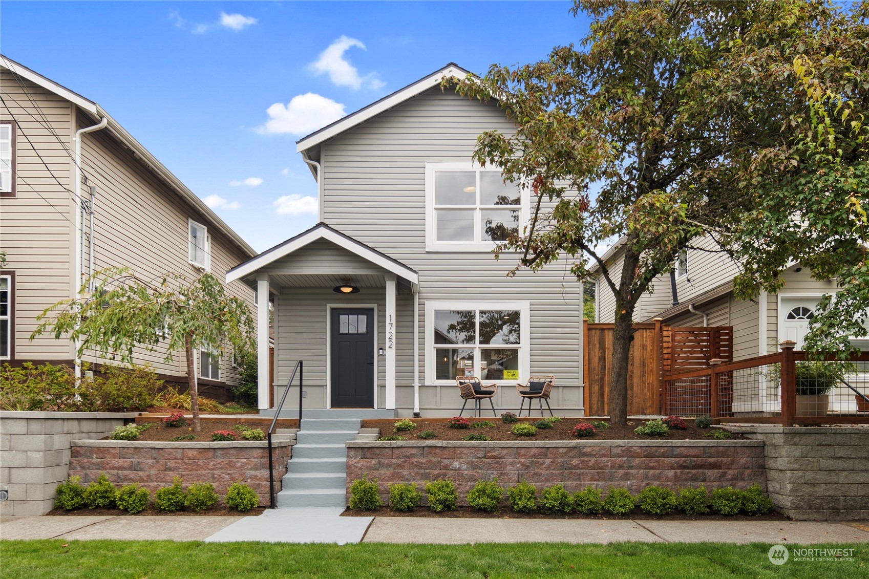 1722 26th Avenue South Seattle, WA 98144 - Photo 2 of 26 a view of a house with a yard and plants