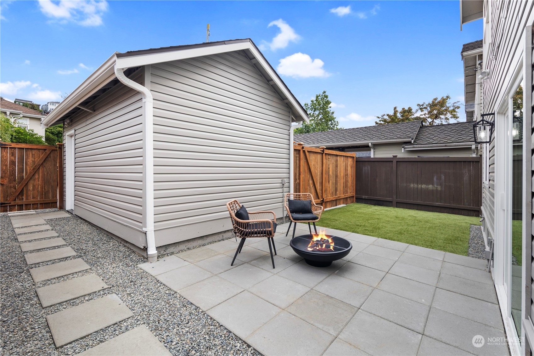 1722 26th Avenue South Seattle, WA 98144 - Photo 22 of 26 a chairs and a table in patio of backyard
