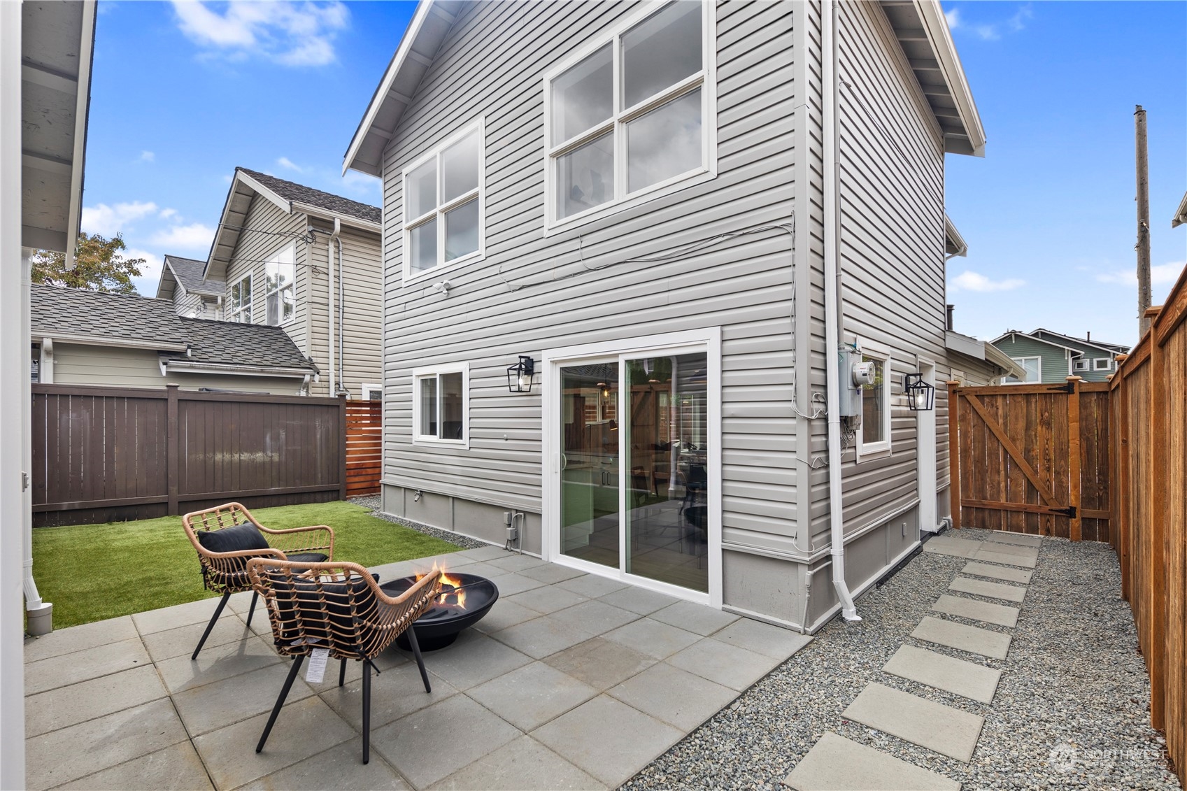 1722 26th Avenue South Seattle, WA 98144 - Photo 24 of 26 a backyard of a house with yard fire pit and outdoor seating