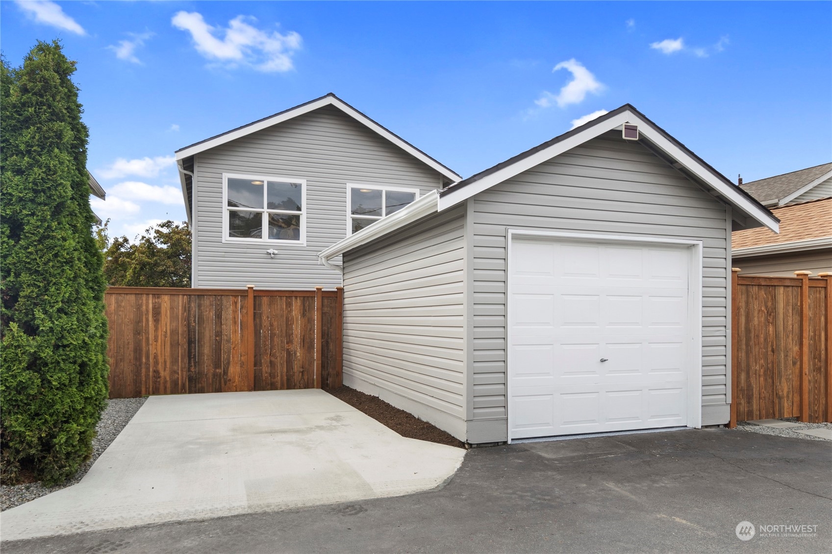 1722 26th Avenue South Seattle, WA 98144 - Photo 25 of 26 a view of backyard of house with garage