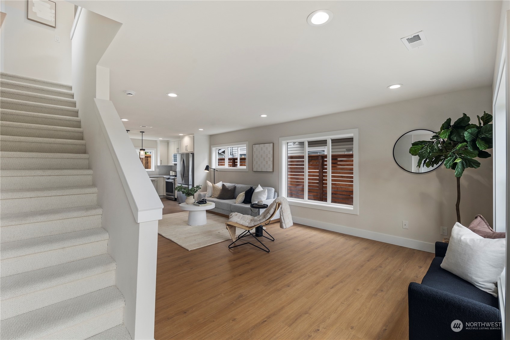 1722 26th Avenue South Seattle, WA 98144 - Photo 3 of 26 a living room with furniture and a potted plant
