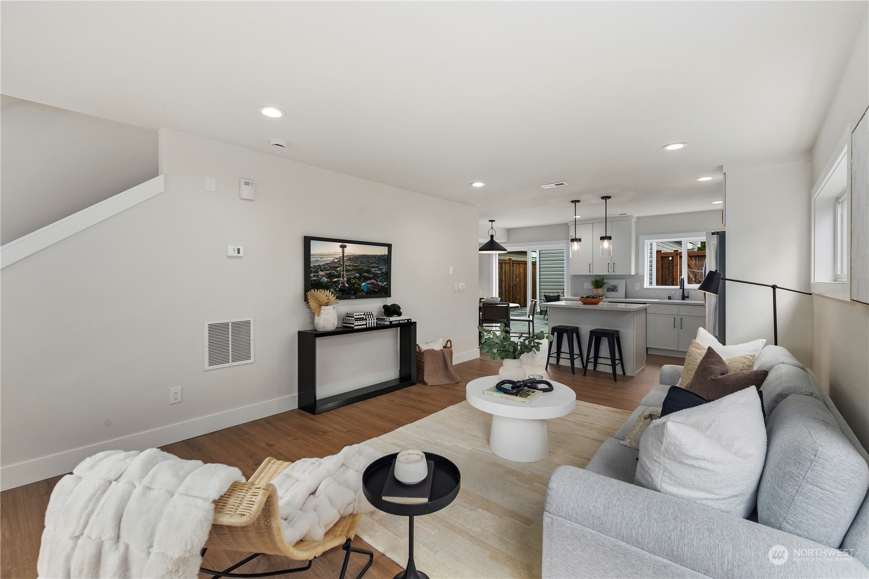 1722 26th Avenue South Seattle, WA 98144 - Photo 5 of 26 a living room with furniture kitchen and a table