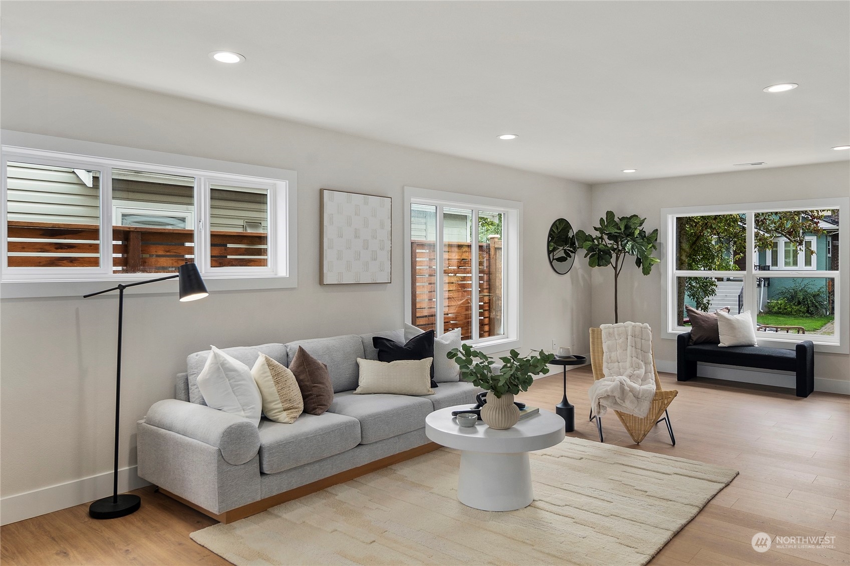 1722 26th Avenue South Seattle, WA 98144 - Photo 7 of 26 a living room with furniture and a potted plant