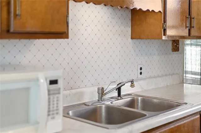 a close view of a sink and tap