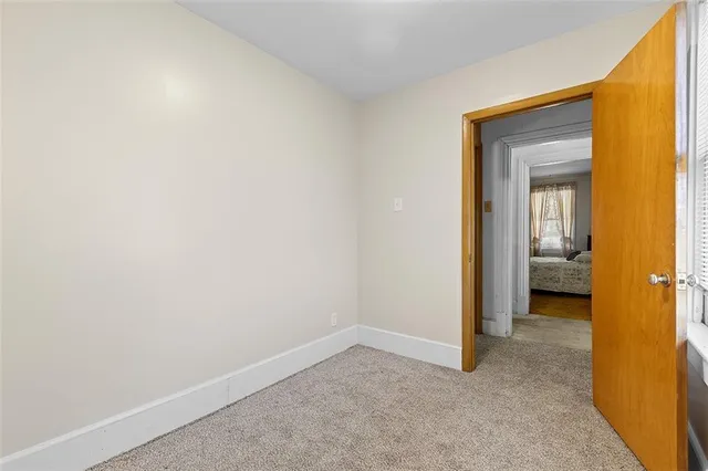 a view of a room with a wardrobe space