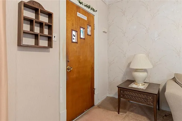 a room with a door and a table