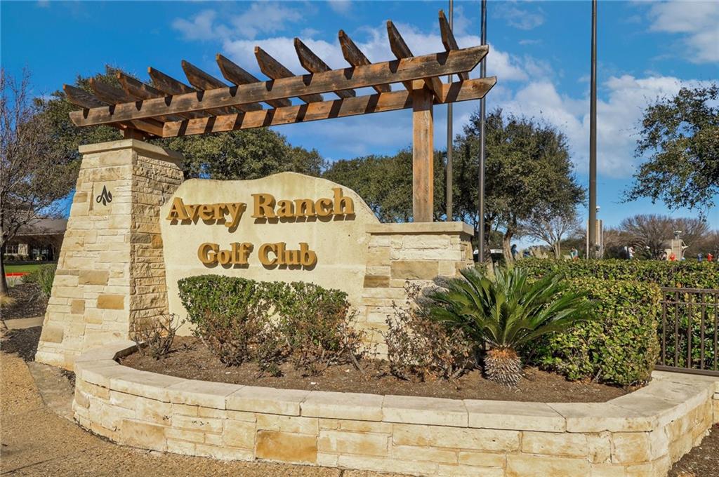 14812 Avery Ranch Boulevard, Unit 12 Austin, TX 78717 - Photo 32 of 38 Community / neighborhood sign featuring a pergola