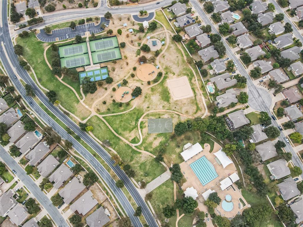 14812 Avery Ranch Boulevard, Unit 12 Austin, TX 78717 - Photo 36 of 38 Aerial view of property and surrounding area with nearby suburban area and a pool
