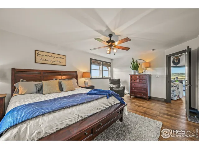 a view of a house with backyard porch and sitting area
