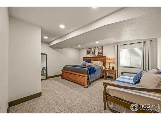 a view of a town with large tree and a yard