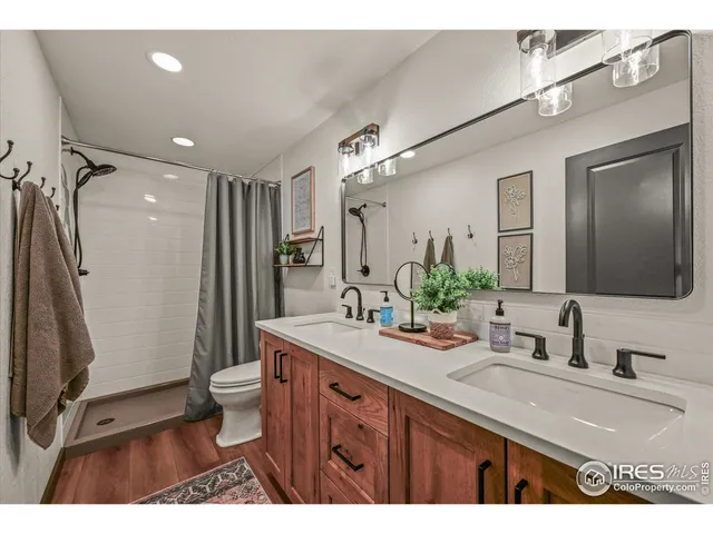 a view of a livingroom with furniture and window