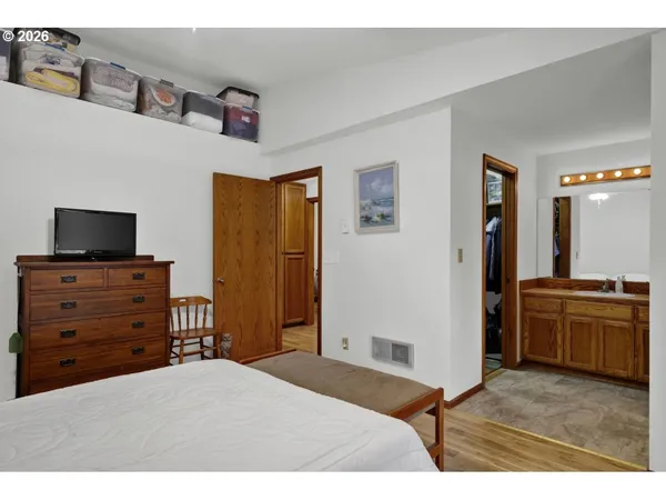 a bedroom with a bed and furniture