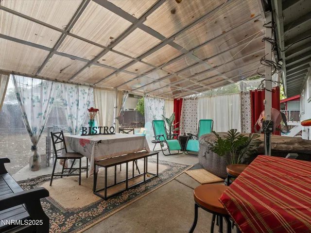 a outdoor dining space with furniture