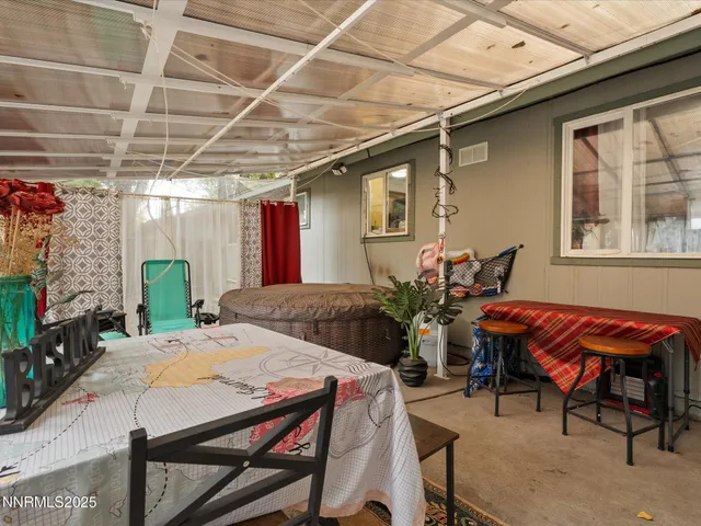 a view of an outdoor space with furniture