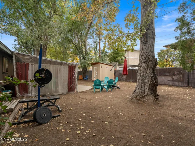 a view of a back yard of the house