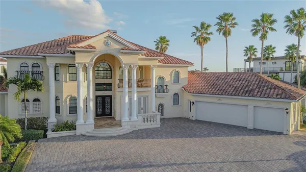 a front view of a house with a garage