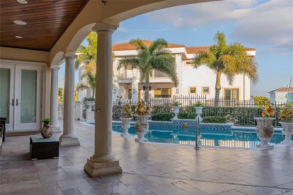 a view of a lobby with a garden and plants