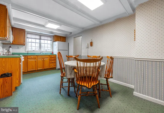 a bed room with furniture and a window