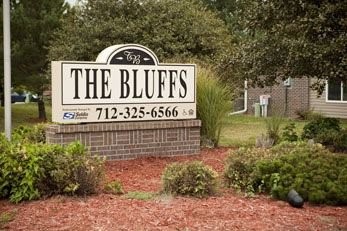 2065 Nash Boulevard Other, IA 51501 - Photo 4 of 8 a view of a wooden house with a small yard