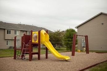 2065 Nash Boulevard Other, IA 51501 - Photo 5 of 8 a view of a house with backyard and a slide