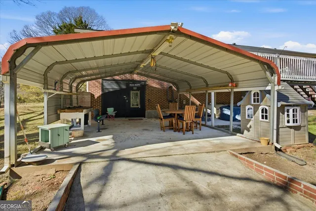 a room with furniture and pool table