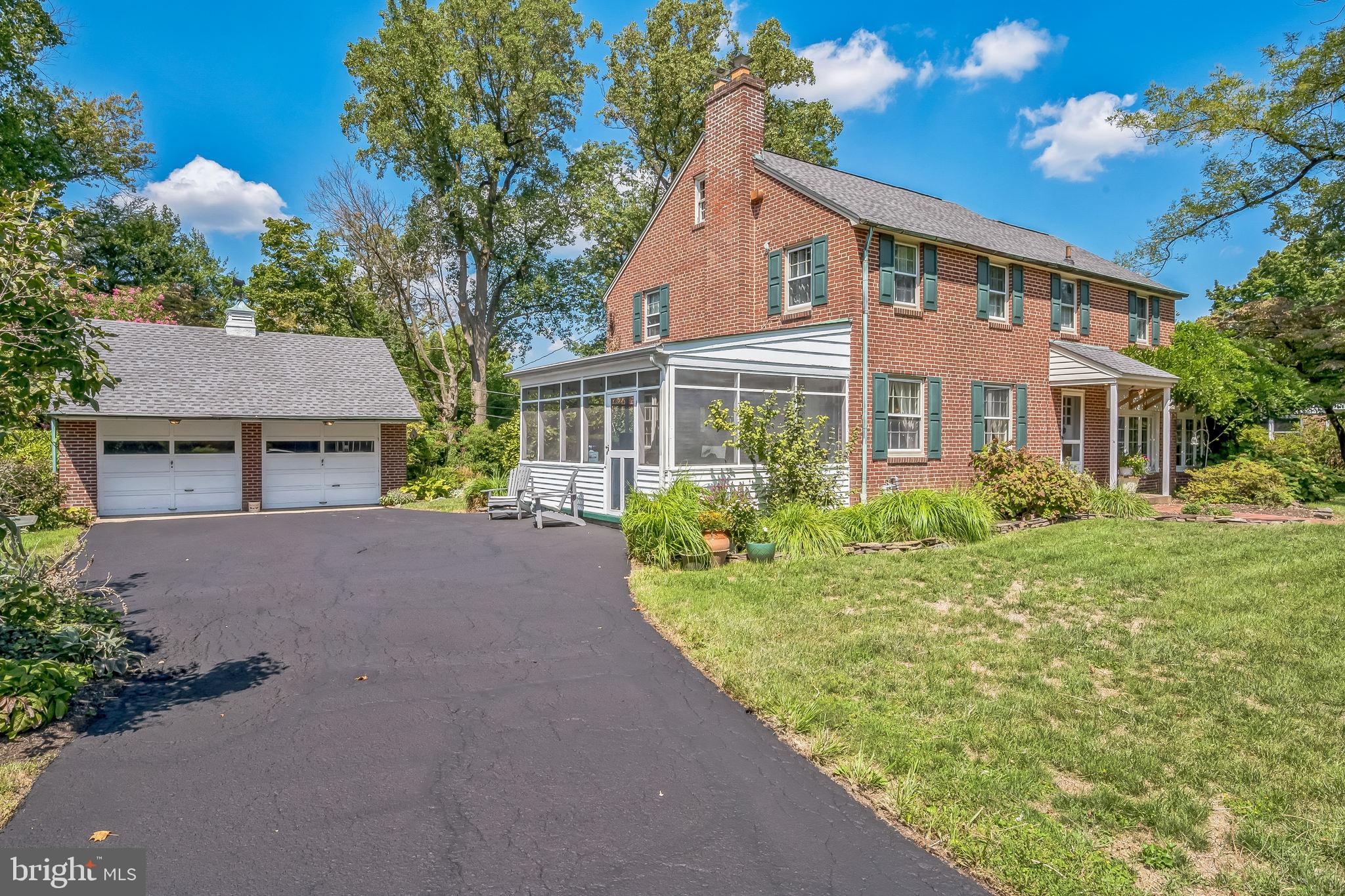 2-Car Detached Garage and freshly sealed driveway