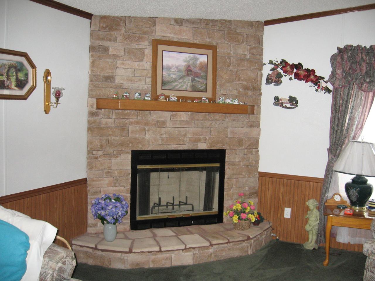107 Crest Court Blue Ridge, VA 24064 - Photo 4 of 7 a living room with furniture and a fireplace
