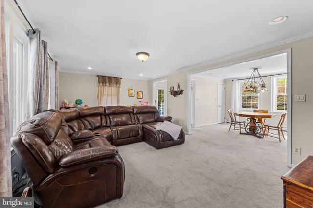 a living room with furniture and a couch