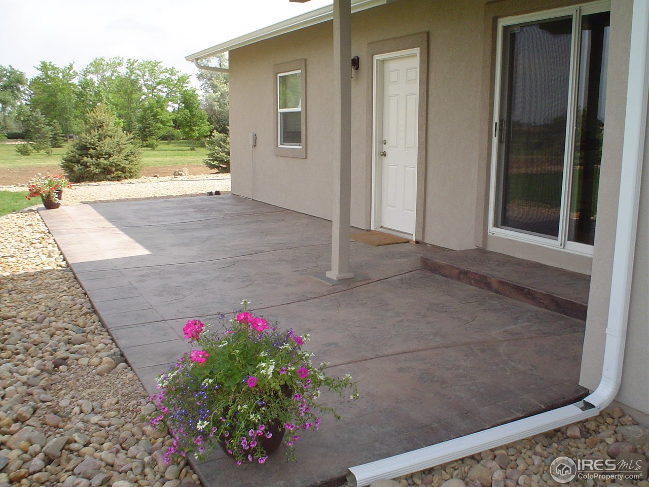 9231 Apache Road Longmont, CO 80504 - Photo 20 of 25 Stamped concrete patio