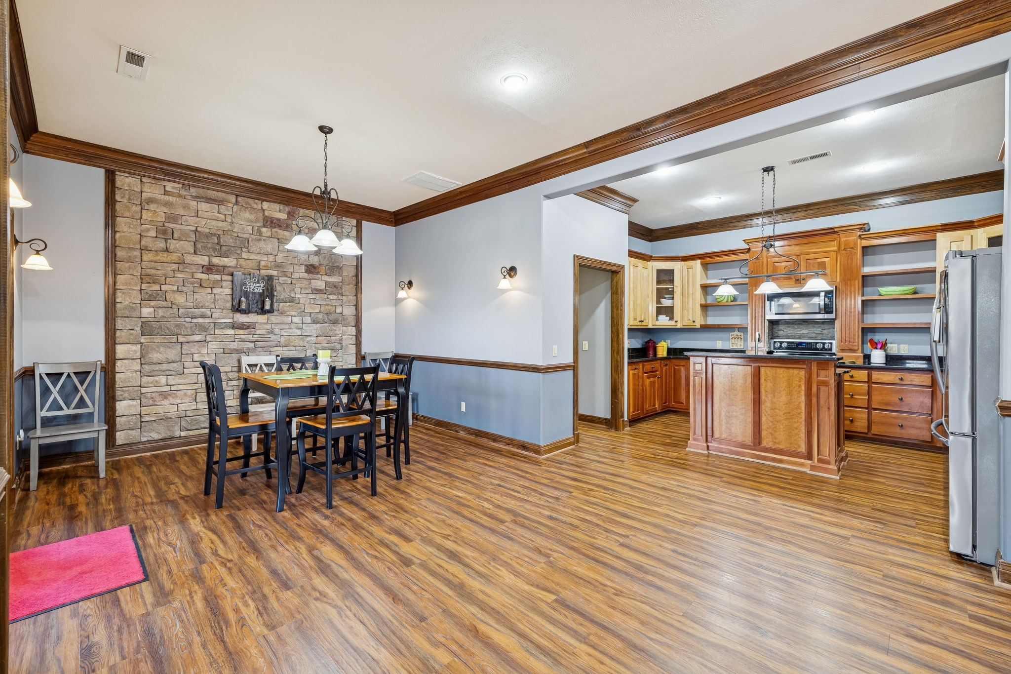 480 Defeated Creek Road Centerville, TN 37033 - Photo 11 of 97 a view of a dining room with furniture and wooden floor